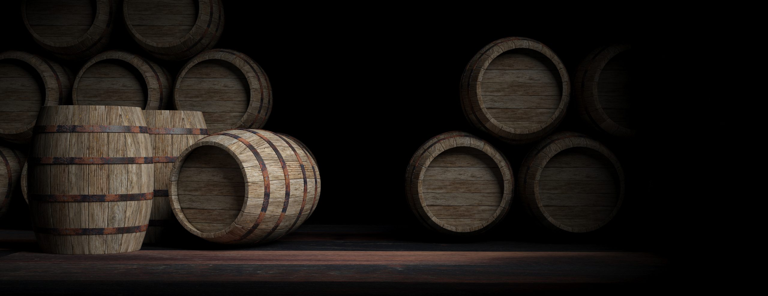Wooden barrels on dark background. 3d illustration